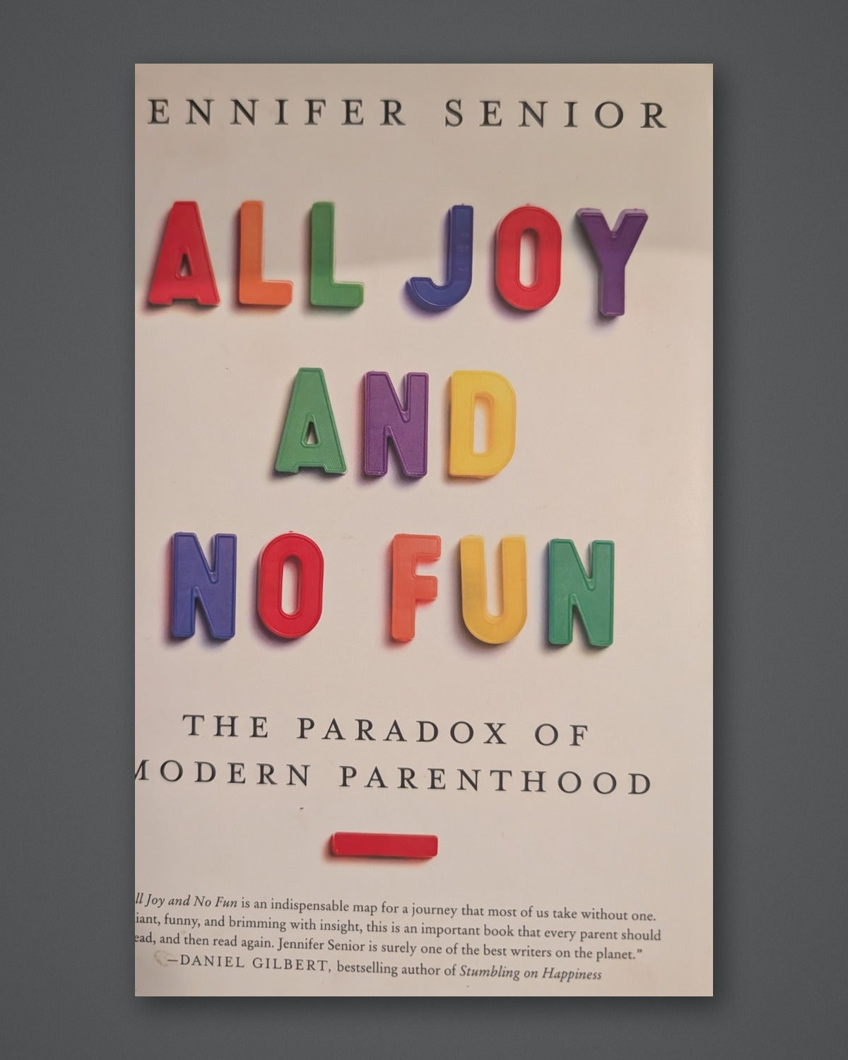 All Joy and No Fun — photographed copy on Paper + Stone gray slate background