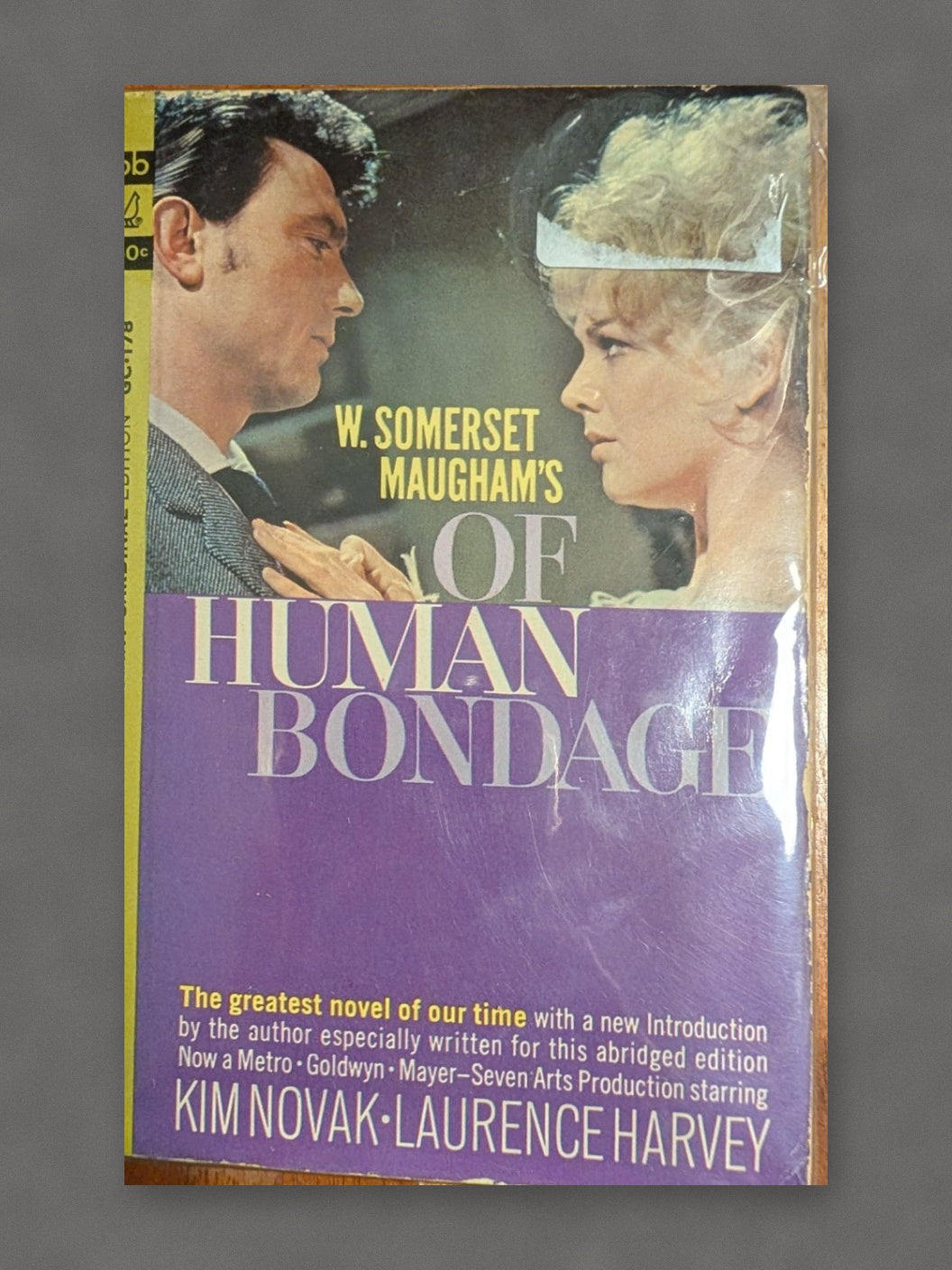 Of Human Bondage book cover on gray slate background