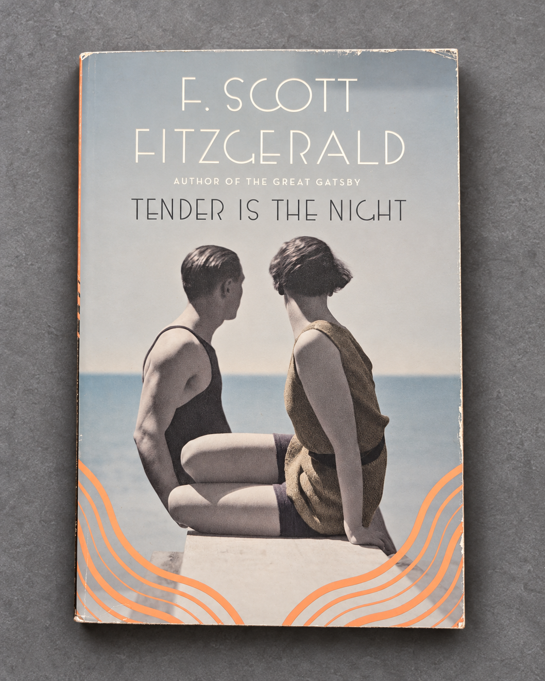 Tender Is the Night book cover on gray slate background
