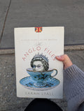 The Anglo Files by Sarah Lyall, preowned hardcover front cover with illustrated blue teacup and crown